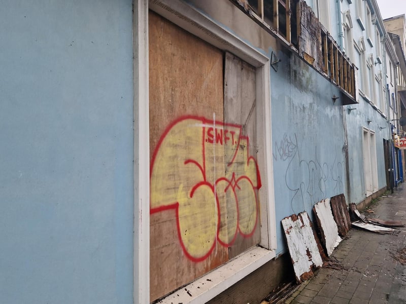 Fallen hoarding at the old Clarendon Bar on Lower Clarendon Street, which remains open.