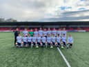 Manager Marty McCann (left) with his Ulster University Magee side who defeated Southwest College, at the Ryan McBride Brandywell Stadium.