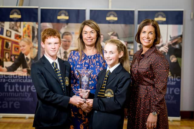 Students in Year 9 who received the Pupil of the Year Award L/R Fionn Mc Gilloway, Mrs Siobhan McCauley (Principal) Ava Doherty, Mrs Suzanne Deery (Head of Key Stage 3)