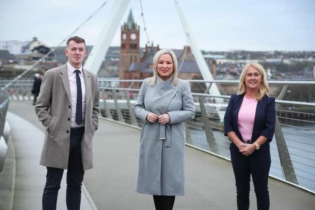 Sinn Féin First Minister Designate Michelle O'Neill pictured previously on the Peace Bridge with Derry MLAs Pádraig Delargy and Ciara Ferguson.