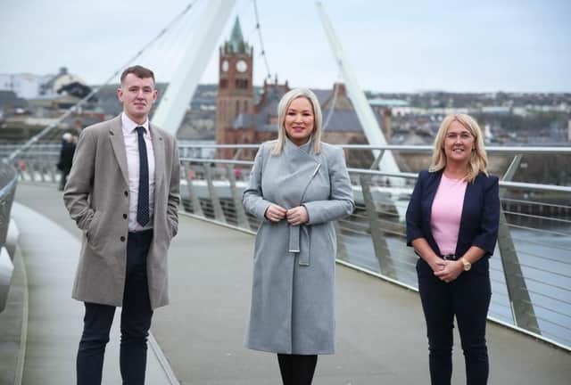 Sinn Féin First Minister Designate Michelle O'Neill pictured previously on the Peace Bridge with Derry MLAs Pádraig Delargy and Ciara Ferguson.
