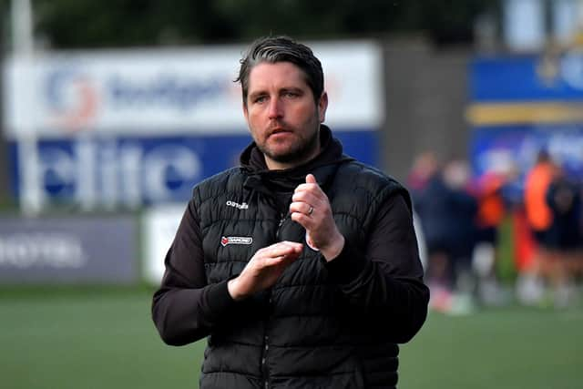 A downbeat Ruaidhri Higgins acknowledges the support from the fans at the end of the FAI Cup game against St Patrick’s Athletic on Sunday evening. Photo: George Sweeney. DER2334GS – 11