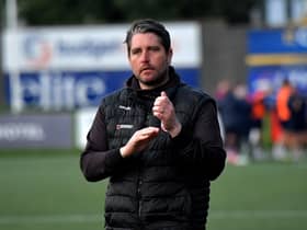 A downbeat Ruaidhri Higgins acknowledges the support from the fans at the end of the FAI Cup game against St Patrick’s Athletic on Sunday evening. Photo: George Sweeney. DER2334GS – 11