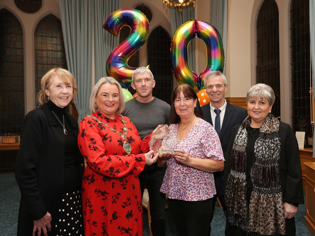 The Mayor Derry, Councillor Sandra Duffy presenting a gift to Maria Maxwell, manager, Shepherd’s View Young Parents Project, at a reception to mark the 20th Anniversary of the project. Included, from left, are Phil Mahon, chair, First Housing, Niall McCarroll, Deputy manager, Shepherd’s View Young Parents Project, Kevin Wright, CEO, and Eileen Best, director of services, First Housing.