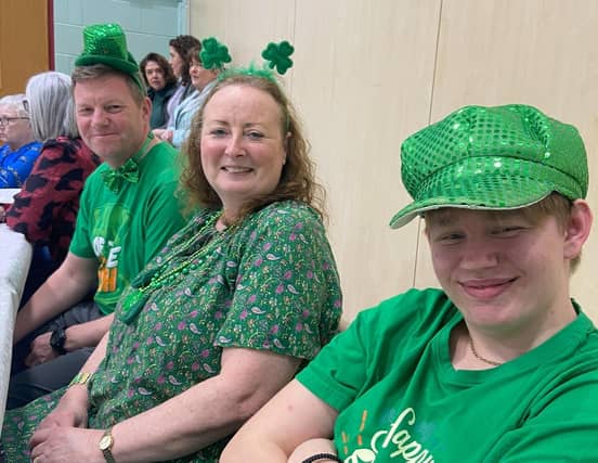 Participants at the cross-community St Patrick's Day evening of song and dance in Eglinton.