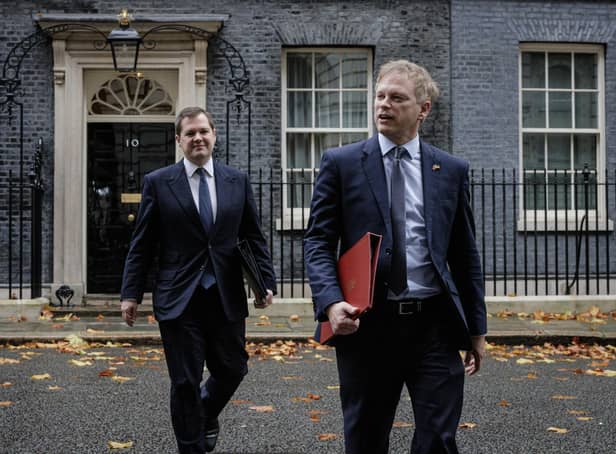 Minister of State for Immigration Robert Jenrick (L) and Secretary of State for Business, Energy and Industrial Strategy Grant Shapps (R) leave 10 Downing Street on Thursday. (Photo by Rob Pinney/Getty Images)