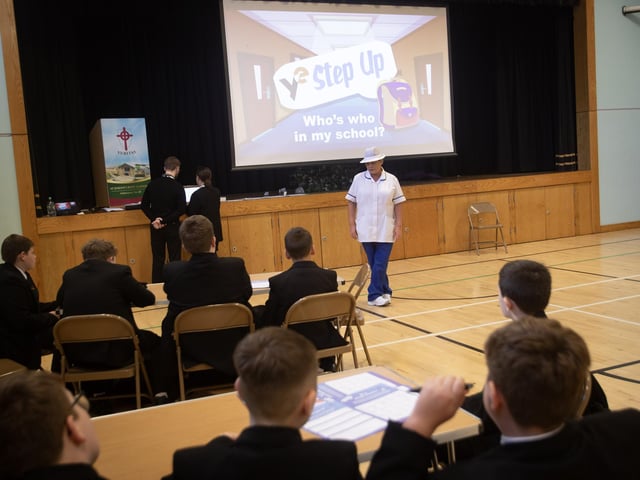 St. Joseph's Boys School canteen staff member Catherine Prince addressing the students at Tuesday's Young Enterprise Workshop in the school.