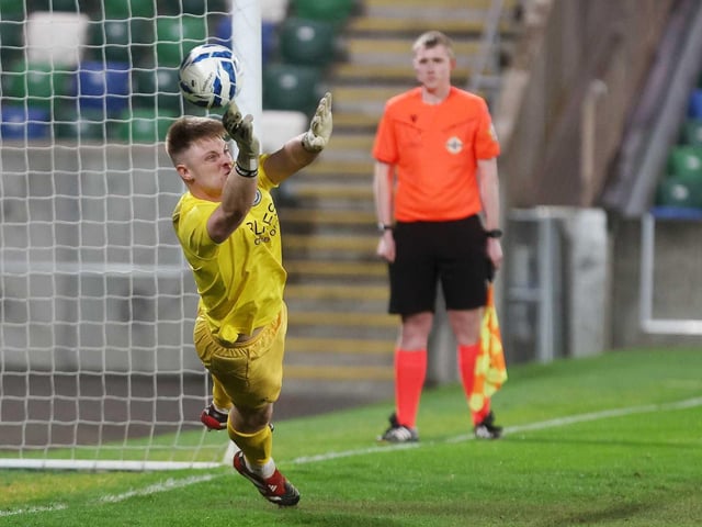 Enniskillen goalkeeper Ben Thompson almost gets his hand to an Ardmore penalty during Friday's dramatic shoot-out. (Photo: IFA)