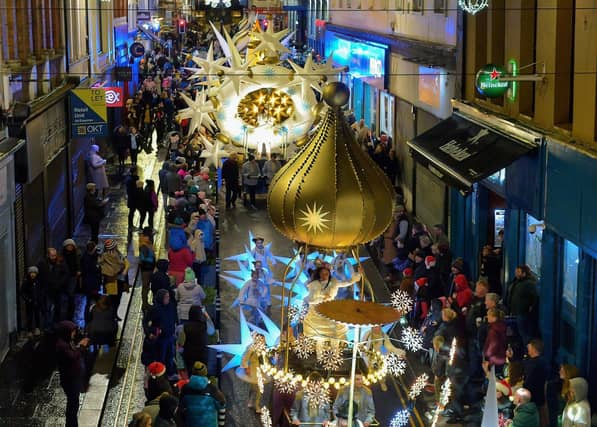 The colourful Derry Christmas procession passes through the city centre on Sunday evening last. Photo: George Sweeney. DER2248GS - 07