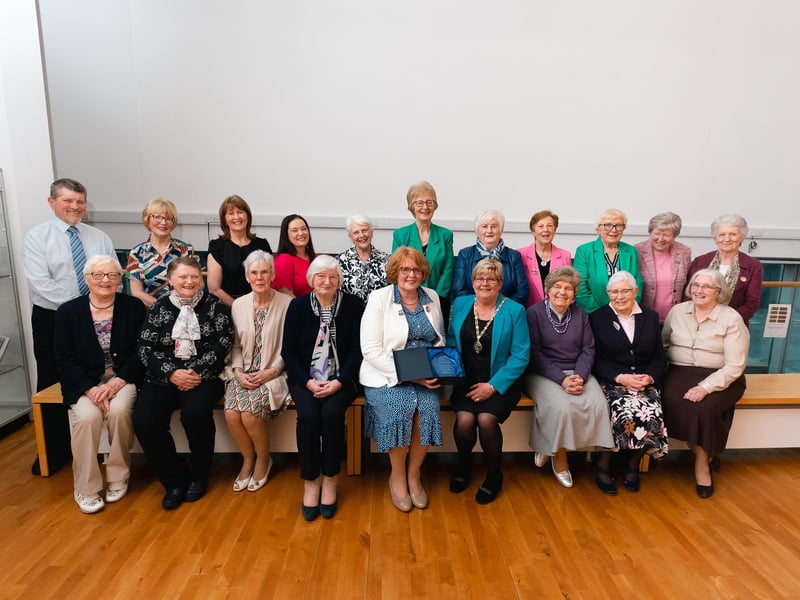 Derry City & Strabane District Council Deputy Mayor Angela Dobbins pictured making a presentation to Joan Beattie, WI Area Executive for Abercorn marking 90 years of the group at a special reception in The Alley Theatre. Also pictured are Alderman Derek Hussey and members of the WI. 