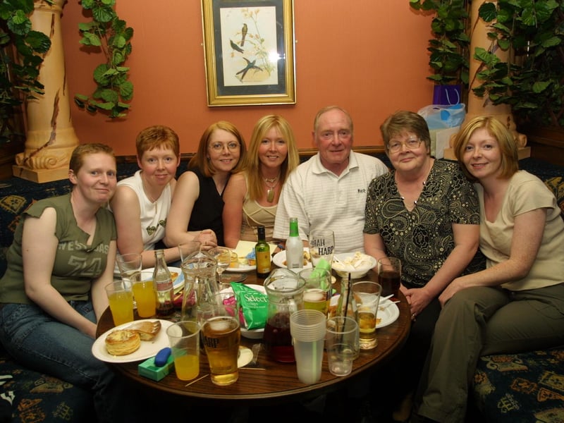Charlie surrounded by his wife Nellie and their five daughters, Tricia, Siobhan, Antoinette, Carole and Paula.