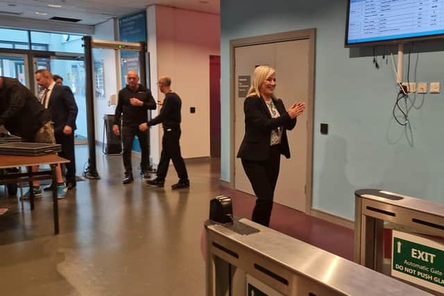 Michelle O'Neill applauds candidates as she arrives at Foyle Arena.