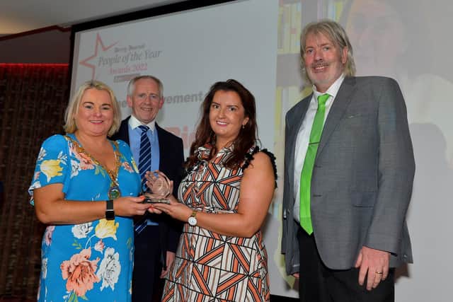 2022: Blathnaid Biddle who received the Lifetime Achievement Award on behalf of her mother Sandra Biddle, Foyle School of Speech & Drama, pictured with Mayor Sandra Duffy from category sponsor Derry City & Strabane District Council, Paul McLean from Principal Sponsor BetMcLean and NW editor William Allen. Photo: George Sweeney.  DER2235GS – 038