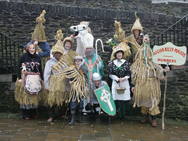 Thge Aughakillymaude Cxommunity Mummers, from Derrylin, who performed in Derry over the weekend as part of the St. Patrick's Day celebrations. (1803C84)