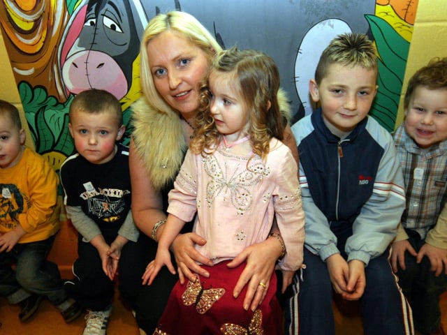 Lee, Shane, mum Mary, Adrianna, Jamie and Adam pose for the camera at the Fun Factory 0032/JML : Parties and celebrations January 2006: Adrianna McIntyre.