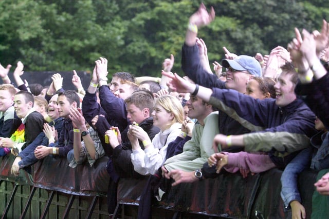 Fans enjoying the Oasis and Ocean Colour Scene concert in September 2002.