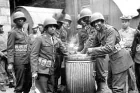 African-American US Army soldiers at a camp cookhouse in NI 1942.