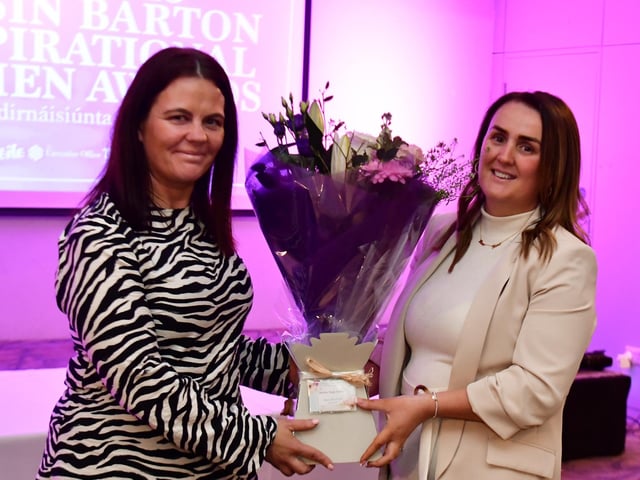 Karinne Doherty receiving her presentation from Aine Doherty, daughter of Roisin Barton. Kevin Morrison.