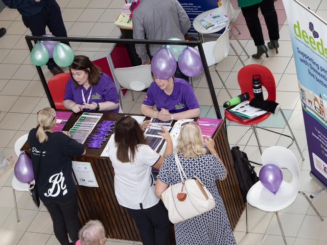 DEEDS representatives Wendy McLaughlin and Eilish Brown dealing with questions from the general public during Friday's One Stop Shop event at Foyleside, Derry.