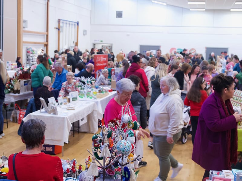 People enjoying the St. Mary's College Christmas Fair.