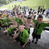 The victorious St. Joseph's Boys celebrate victory on Thursday in Belfast. (Photo: Jim McCafferty)