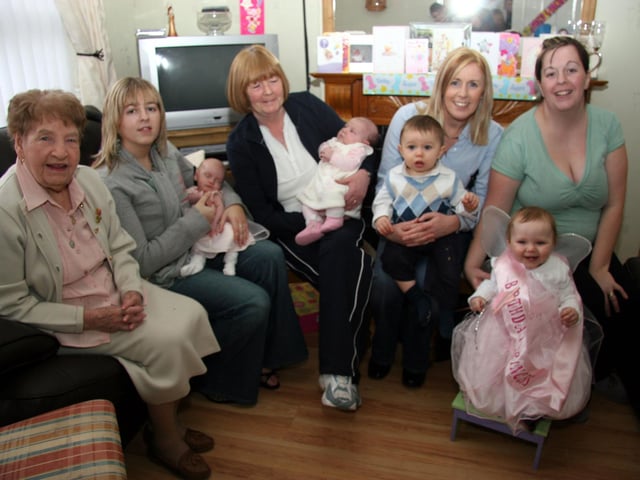 Annie, Patricia, Maria, Ann, Kathleen pictured with babies, Katie, Amber, Gavin and birthday girl Beth 0028JML : Parties and nights out in Derry and Donegal in February 2006.