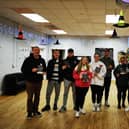 CRJ staff Mickey Anderson(left) and Eamon Mc Ginley (right) pictured with Youth leaders from the Glen and Rosemount at the fireworks safety work