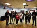 CRJ staff Mickey Anderson(left) and Eamon Mc Ginley (right) pictured with Youth leaders from the Glen and Rosemount at the fireworks safety work