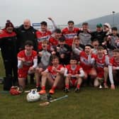 Derry Under 20 players and management celebrate their Ulster Under 20 Championship success in Corrigan Park on Sauday. (Photo: Derry GAA)