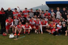 Derry Under 20 players and management celebrate their Ulster Under 20 Championship success in Corrigan Park on Sauday. (Photo: Derry GAA)