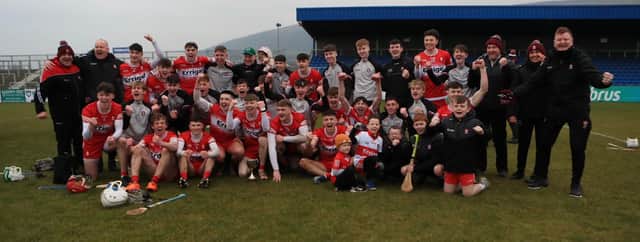Derry Under 20 players and management celebrate their Ulster Under 20 Championship success in Corrigan Park on Sauday. (Photo: Derry GAA)