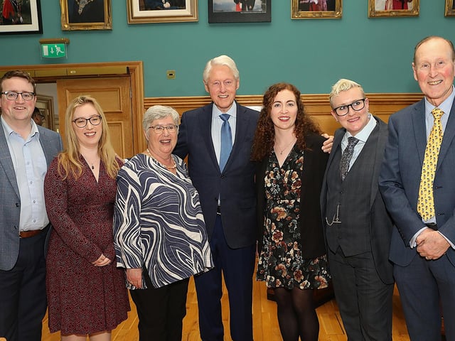 Bill Clinton with Daphne Trimble and members of her family.