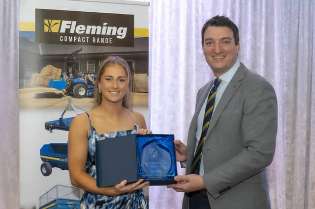 Women's Warrior 'Player of the Year' and Women's Premiership batting winner Alana Dalzell (Bready) gets award from Peter McCartney