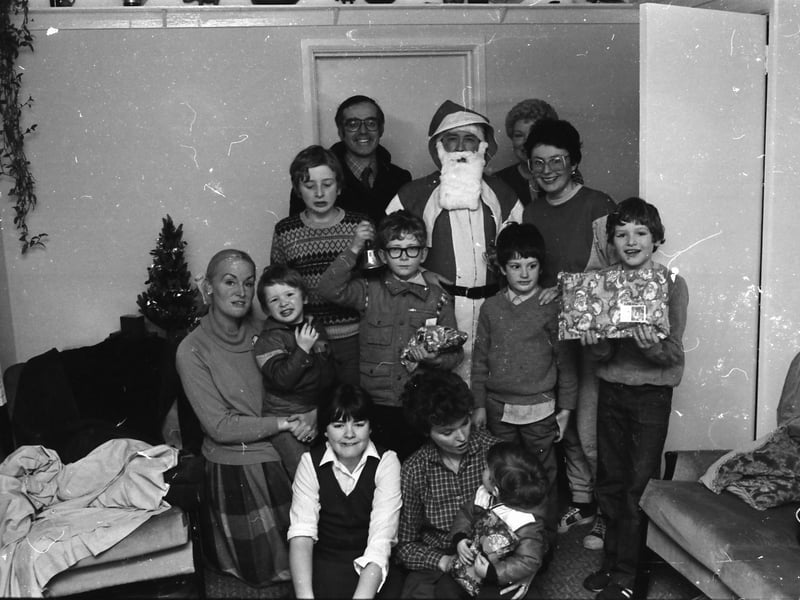 Santa delivering presents in 1984.