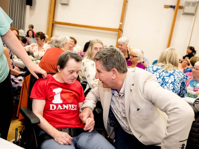 Daniel O'Donnell with a guest at the Afternoon Tea with Daniel O'Donnell on Sunday in St Mary's College, Derry, in conjunction with St Eugene's Cathedral. Picture: Stephen Latimer.