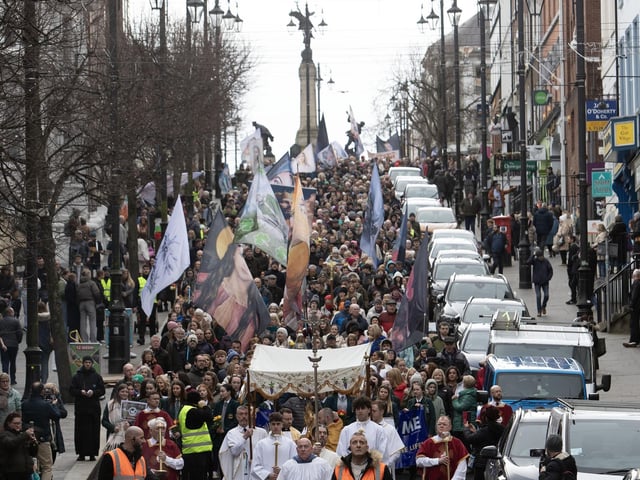 The procession makes its way down through Shipquay Gate and onto Guildhall Square for the Rosary on Saturday.