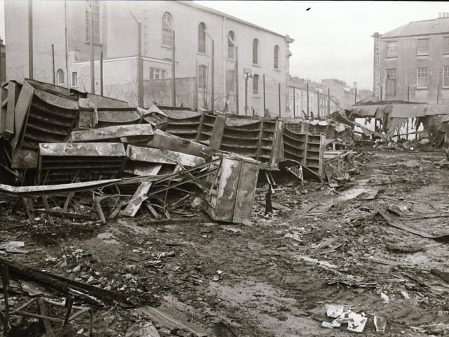 The aftermath of rioting in Derry during which the Post Office sorting office was burnt down.