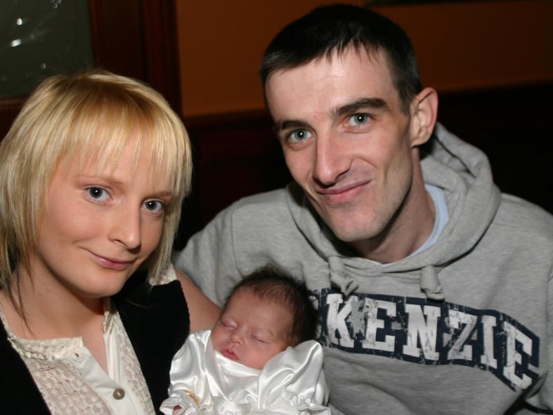 Godparents Nadine Johnston and Anthony Donegan with baby Casey Leigh. 878 /dd : Casey Leigh Johnston's baptism party.