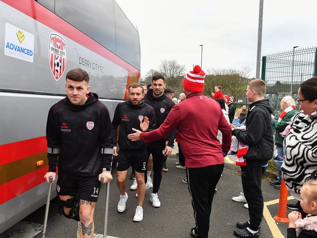 Derry City players greet fans gathered at Brandywell Stadium on Saturday morning prior to their departure for Dublin ahead of Sunday’s FAI Cup Final against Drogheda United. Photograph: George Sweeney.