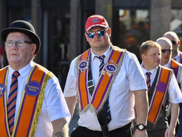 Orangemen take part in the July 12 celebrations in Derry’s city centre on Saturday morning. Photo: George Sweeney