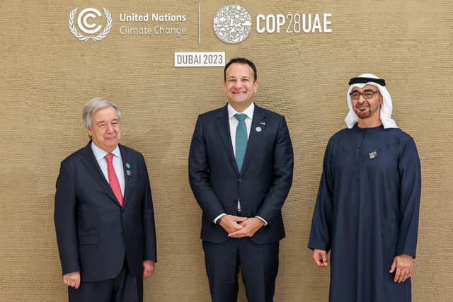 DUBAI, UNITED ARAB EMIRATES - DECEMBER 1: In this handout image supplied by COP28,  (L-R) António Guterres, United Nations Secretary-General, Leo Varadkar, Taoiseach of Ireland and His Highness Mohamed bin Zayed Al Nahyan, President of the United Arab Emirates and Ruler of Abu Dhabi during the UN Climate Change Conference COP28 at Expo City Dubai on December 1, 2023 in Dubai, United Arab Emirates. The COP28, which is running from November 30 through December 12, brings together stakeholders, including international heads of state and other leaders, scientists, environmentalists, indigenous peoples representatives, activists and others to discuss and agree on the implementation of global measures towards mitigating the effects of climate change. (Photo by Mahmoud Khaled / COP28 via Getty Images)