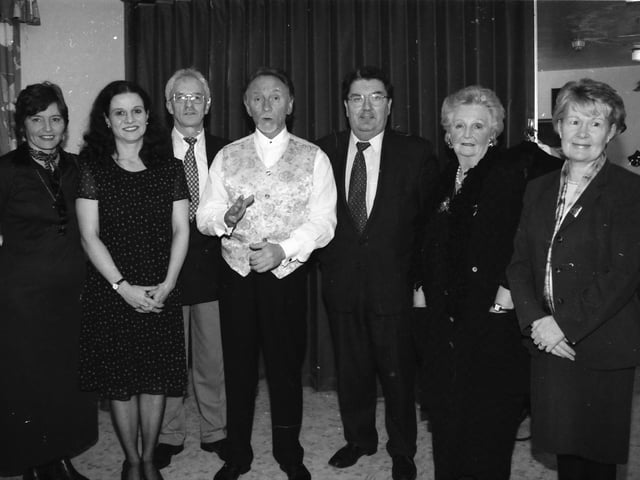 Phil Coulter, pictured with, from left, Teresa McKeever, Mary Crumley, Tony O'Doherty, John Hume, Mrs. Kate Neeson and Mrs. Pat Hume, at St. Mary's Community Centre.