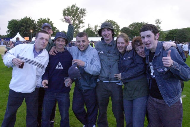 Fans enjoying the Oasis and Ocean Colour Scene concert in September 2002.