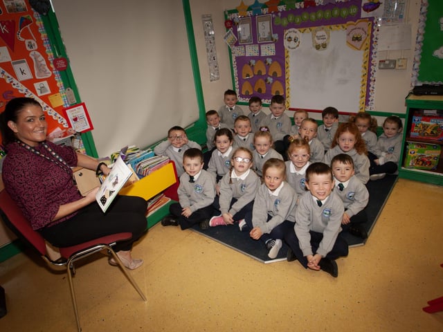 Mrs. Catherine Hegarty pictured with her P1 class at Sacred Heart PS, Waterside this week. (Photos: Jim McCafferty Photography)