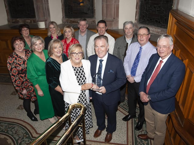 Carmel Dunn, former Principal of Hollybush PS pictured with her husband and family during Wednesday’s Mayoral Reception in the Guildhall.
