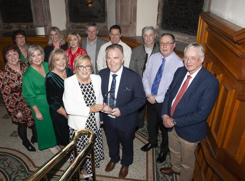 Carmel Dunn, former Principal of Hollybush PS pictured with her husband and family during Wednesday’s Mayoral Reception in the Guildhall.