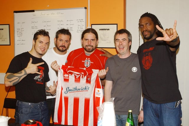 Brazilian heavy metal band Sepultura pictured with Nerve Centre manager in Tony Doherty.