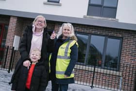 Gemma Burke pictured with her son Coby outside their new home in Clon Dara which she says “has made such a difference to us as a family”. Also pictured, Jacinta Kearns from Apex.