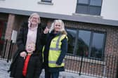 Gemma Burke pictured with her son Coby outside their new home in Clon Dara which she says “has made such a difference to us as a family”. Also pictured, Jacinta Kearns from Apex.