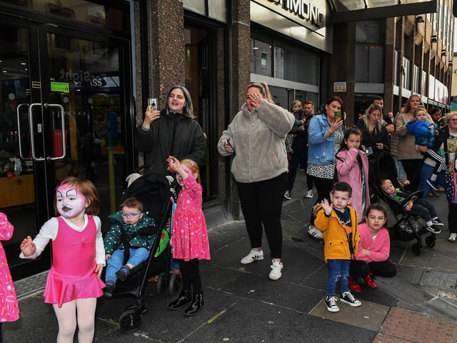 Families await the arrival of Santa at the Richmond Shopping Centre on Saturday morning. Photo: George Sweeney